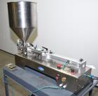 Used Wenzhou Rigao Table Top Semi Automatic Piston Filler, Model DYF. 316L Stainless steel product contact. Filling speed 5 to 20 bottles per minute. Filling accuracy /= 1% +/-. Filling range: approx...